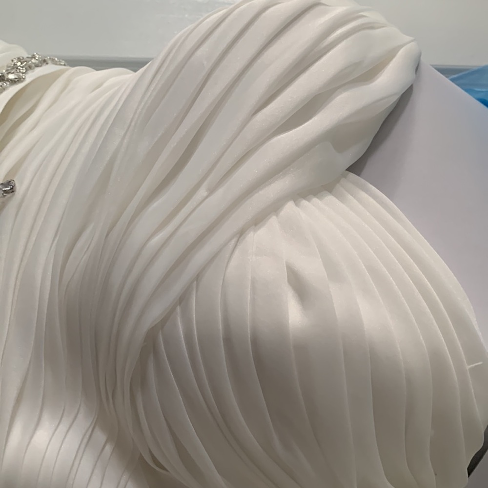 Beautiful off white Demtria cascading wedding dress.  Size 10, but altered. - Picture 3 of 12